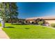 View of the community featuring lush lawns and well-maintained exteriors at 501 W Hononegh Dr # 2, Phoenix, AZ 85027