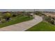 Well-maintained paved walking path surrounded by lush landscaping and green spaces at 5054 S Advant Ter, Mesa, AZ 85212