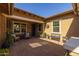 Cozy courtyard featuring outdoor seating, tiled flooring, and a tranquil atmosphere at 5054 S Advant Ter, Mesa, AZ 85212