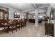 Formal dining room featuring a wooden table with seating for eight and decorative accents at 5054 S Advant Ter, Mesa, AZ 85212