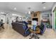 Inviting living room featuring tile floors, ceiling fan, and a fireplace at 5054 S Advant Ter, Mesa, AZ 85212