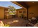 Private patio with comfortable seating and a view of the neighborhood at 5054 S Advant Ter, Mesa, AZ 85212