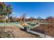 Large community playground with slides, climbing structures, and plenty of open space at 5054 S Advant Ter, Mesa, AZ 85212