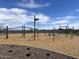 A modern playground equipped with various climbing structures and play equipment for children at 5615 W Summerside Rd, Laveen, AZ 85339