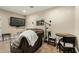 Cozy living area with a comfortable sofa, a modern floor lamp, and stylish decor at 5641 E Aster Dr, Scottsdale, AZ 85254