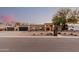 Well-maintained house with a modern garage, desert landscaping, and a charming mailbox at 5641 E Aster Dr, Scottsdale, AZ 85254