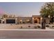 Beautiful single-story home featuring desert landscaping, modern design, and a spacious driveway at 5641 E Aster Dr, Scottsdale, AZ 85254