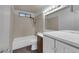 Bathroom featuring a shower-tub combo, modern fixtures, and a clean, functional design at 6132 W Windsor Ave, Phoenix, AZ 85033