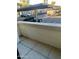 A balcony overlooking a carport area with cars parked beneath at 6900 E Princess Dr # 1229, Phoenix, AZ 85054