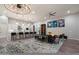 Open-concept living area with a modern kitchen, stylish decor, and a seamless flow for effortless living and entertaining at 7340 E Conquistadores Dr, Scottsdale, AZ 85255
