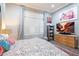 Comfortable main bedroom with natural light, stylish decor, and a TV at 7340 E Conquistadores Dr, Scottsdale, AZ 85255
