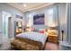 Comfortable main bedroom showcasing soft natural light, stylish decor, and a serene ambiance at 7340 E Conquistadores Dr, Scottsdale, AZ 85255