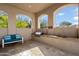 Outdoor bar with a grill and sink surrounded by a seating area at 7340 E Conquistadores Dr, Scottsdale, AZ 85255