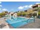 Beautiful community pool with lounge chairs and lush landscaping surrounding for a resort-style experience at 7340 E Conquistadores Dr, Scottsdale, AZ 85255