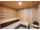 Inviting wooden sauna with benches, offering a relaxing spa-like experience at 7340 E Conquistadores Dr, Scottsdale, AZ 85255