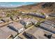 An elevated view shows the property nestled within a picturesque community in a mountainous location at 921 E Buist Ave, Phoenix, AZ 85042