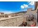 Balcony with comfortable outdoor seating and beautiful views of the neighborhood and surrounding mountain landscape at 921 E Buist Ave, Phoenix, AZ 85042