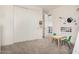 Spacious bedroom with a large closet, play table, and neutral decor, perfect for personalization at 921 E Buist Ave, Phoenix, AZ 85042