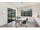 Cozy breakfast nook with a round table and sliding glass doors at 921 E Buist Ave, Phoenix, AZ 85042