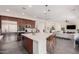 Spacious kitchen featuring a large center island, modern appliances, and seamless access to living area at 921 E Buist Ave, Phoenix, AZ 85042
