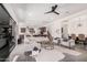 Spacious living room with a comfortable sofa and a view of the kitchen at 921 E Buist Ave, Phoenix, AZ 85042