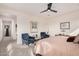 Comfortable main bedroom with sitting area and en-suite bathroom access at 921 E Buist Ave, Phoenix, AZ 85042