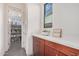 Well-organized pantry with ample storage and a bright window at 921 E Buist Ave, Phoenix, AZ 85042