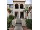 Exterior of an apartment building with a palm tree at 10080 E Mountainview Lake Dr # 110, Scottsdale, AZ 85258