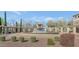 Community fountain surrounded by a trellised walkway at 10909 E Sentiero Ave, Mesa, AZ 85212
