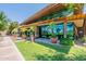 Community center exterior featuring modern design, large windows, and manicured landscaping at 12035 W Roy Rogers Rd, Peoria, AZ 85383