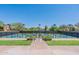 Community pickleball courts with well-maintained landscaping, and an entry gate at 12035 W Roy Rogers Rd, Peoria, AZ 85383