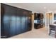 Spacious kitchen featuring dark cabinets, stainless steel appliances, and ample storage space for all your culinary needs at 12035 W Roy Rogers Rd, Peoria, AZ 85383