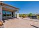 Outdoor patio featuring desert landscaping, a built-in barbecue, and an awning at 12035 W Roy Rogers Rd, Peoria, AZ 85383