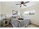 This bedroom features natural light, neutral colors, and a ceiling fan at 1504 W 6Th St, Mesa, AZ 85201