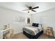 This bedroom has natural light, desk space, and a cozy feel with neutral colors at 1504 W 6Th St, Mesa, AZ 85201