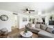 Inviting living room with a ceiling fan, neutral colors, and wood flooring at 1504 W 6Th St, Mesa, AZ 85201