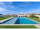 Sparkling pool provides a refreshing oasis, set amidst a beautifully landscaped backyard at 19612 W Georgia Ave, Litchfield Park, AZ 85340