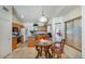 Well-appointed kitchen featuring tile floors, wood cabinets, and a cozy breakfast nook perfect for casual dining at 20218 N 61St Ave, Glendale, AZ 85308