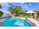 This refreshing pool is surrounded by lush landscaping, patio and seating at 20218 N 61St Ave, Glendale, AZ 85308