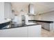Bright kitchen featuring stainless steel appliances, gray cabinets, and granite countertops at 2121 S Ventura Dr, Tempe, AZ 85282
