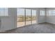 Balcony with sliding glass doors provides seamless indoor-outdoor flow and scenic views at 2312 N Raven --, Mesa, AZ 85207