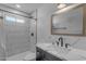 Modern bathroom with a walk-in shower, bright vanity, and beautiful fixtures at 2312 N Raven --, Mesa, AZ 85207