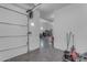 Spacious garage featuring an automatic door and access to ample storage space at 2312 N Raven --, Mesa, AZ 85207