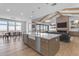 This gourmet kitchen features a large island, a farmhouse sink, and stainless steel appliances at 2312 N Raven --, Mesa, AZ 85207