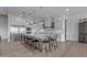 Bright kitchen featuring white cabinetry, a large center island, and stainless steel appliances at 2312 N Raven --, Mesa, AZ 85207