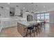 Gourmet kitchen with large island, white cabinetry, and stainless steel appliances, perfect for entertaining at 2312 N Raven --, Mesa, AZ 85207