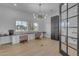 Bright office space with dual desks, modern lighting, and large windows offering natural light at 2312 N Raven --, Mesa, AZ 85207