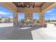 Community outdoor pavilion with stone fireplace and ample covered space for events and gatherings at 2312 N Raven --, Mesa, AZ 85207
