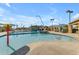 Spacious community pool area offers separate pool and spa, rock waterfall and splash features at 2312 N Raven --, Mesa, AZ 85207