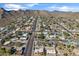 Aerial view of the community featuring tree-lined streets, beautiful houses, and mountain backdrop at 2366 E Shea Blvd, Phoenix, AZ 85028